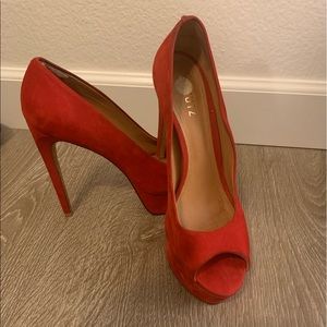 Red peep toe pump